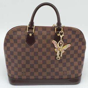 Authentic Louis Vuitton Gold Lock 🔒 Unbranded Butterfly Keychain Bag Charm LV